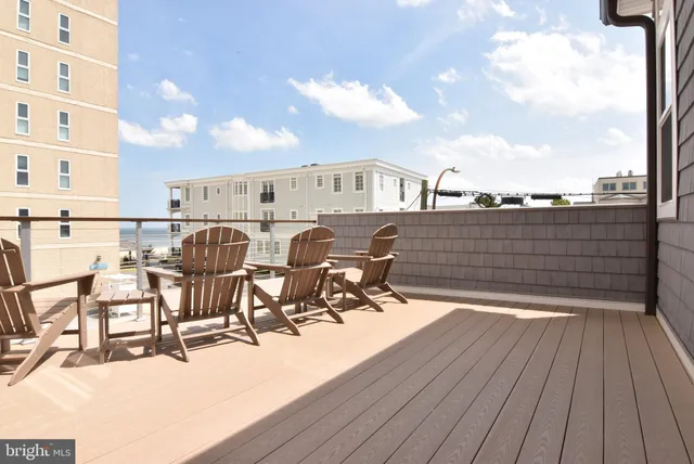a view of a terrace with seating area
