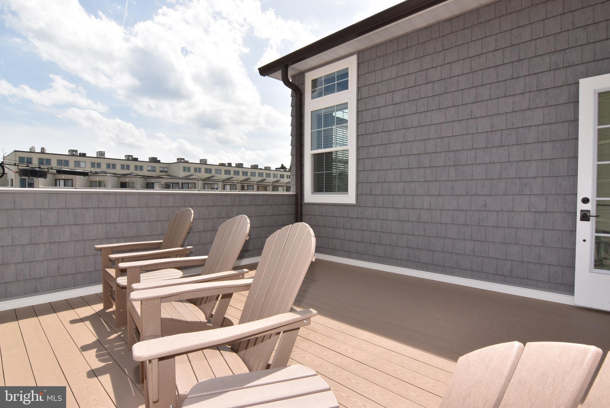 3 Laurel Street Rehoboth Beach, DE 19971 - Photo 42 of 47 a view of a chairs in a balcony