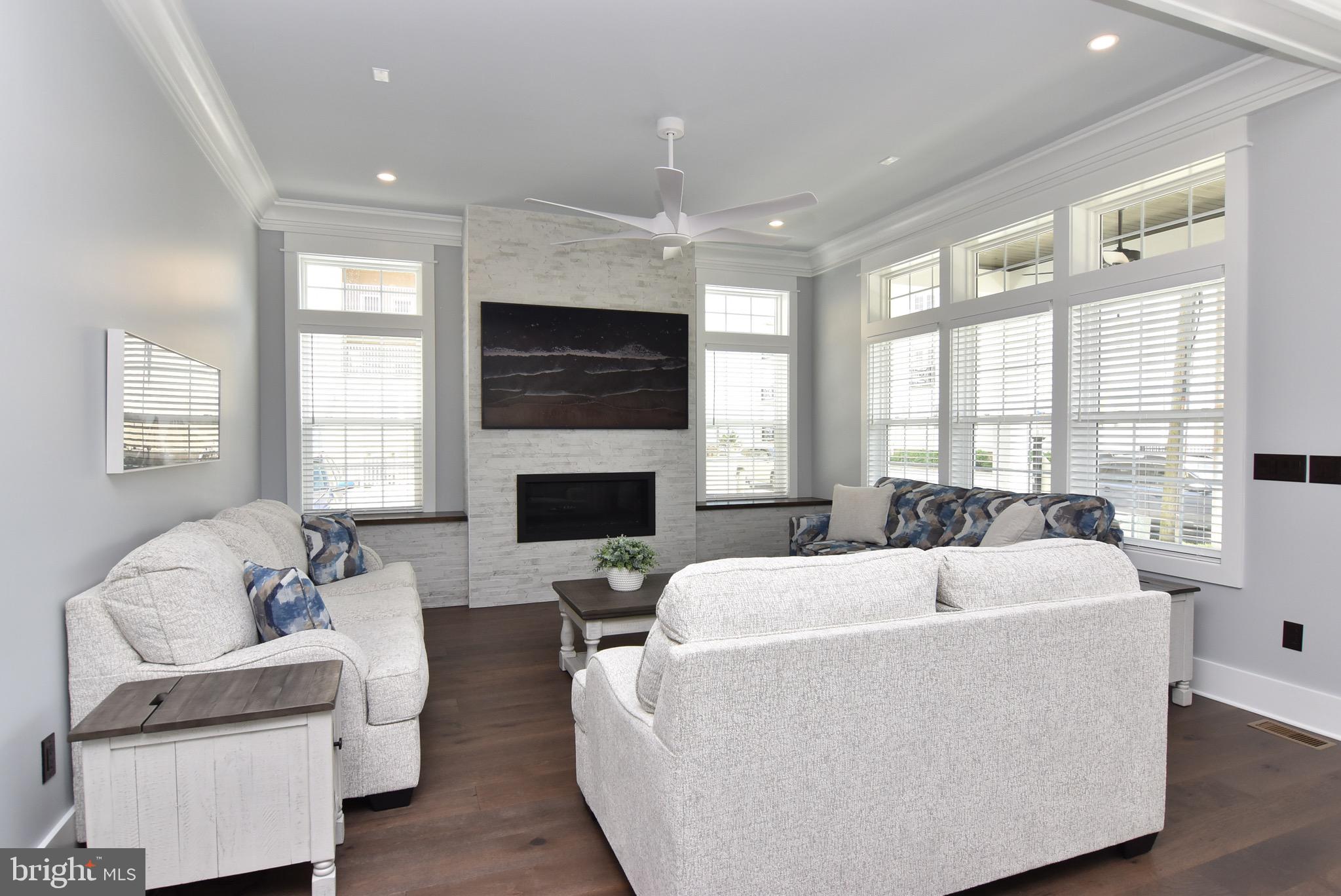 3 Laurel Street Rehoboth Beach, DE 19971 - Photo 5 of 47 a living room with furniture fireplace and window