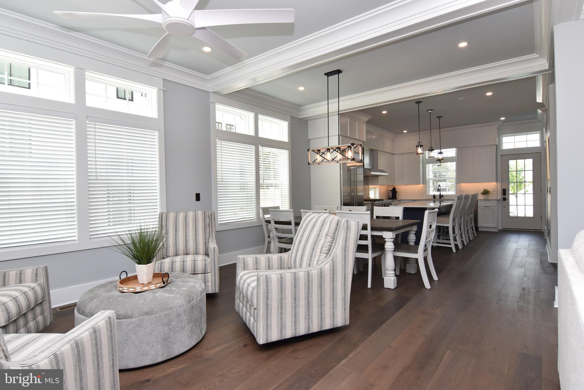 3 Laurel Street Rehoboth Beach, DE 19971 - Photo 7 of 47 a living room with furniture and wooden floor