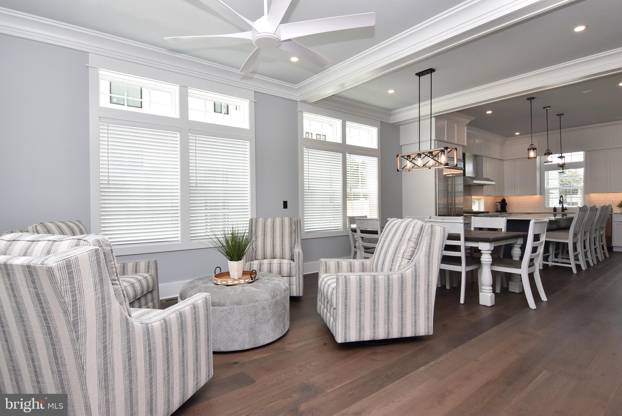 3 Laurel Street Rehoboth Beach, DE 19971 - Photo 8 of 47 a living room with furniture and wooden floor