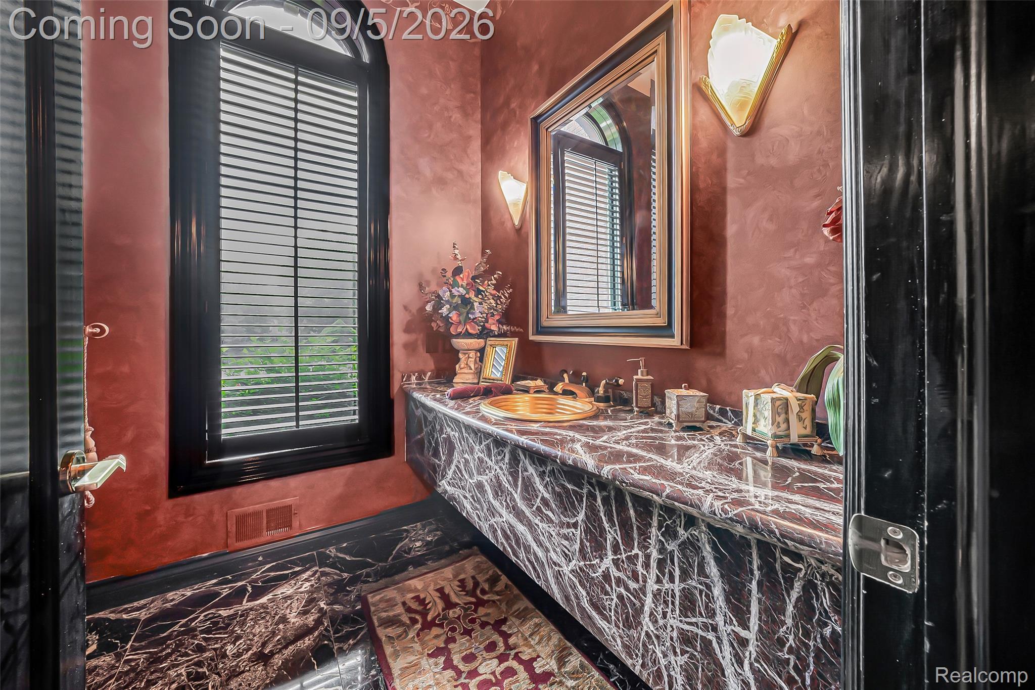 2785 Cranbrook Ridge Court Rochester, MI 48306 - Photo 18 of 97 Marble-clad vanity with an integrated sink and wall-mounted sconces