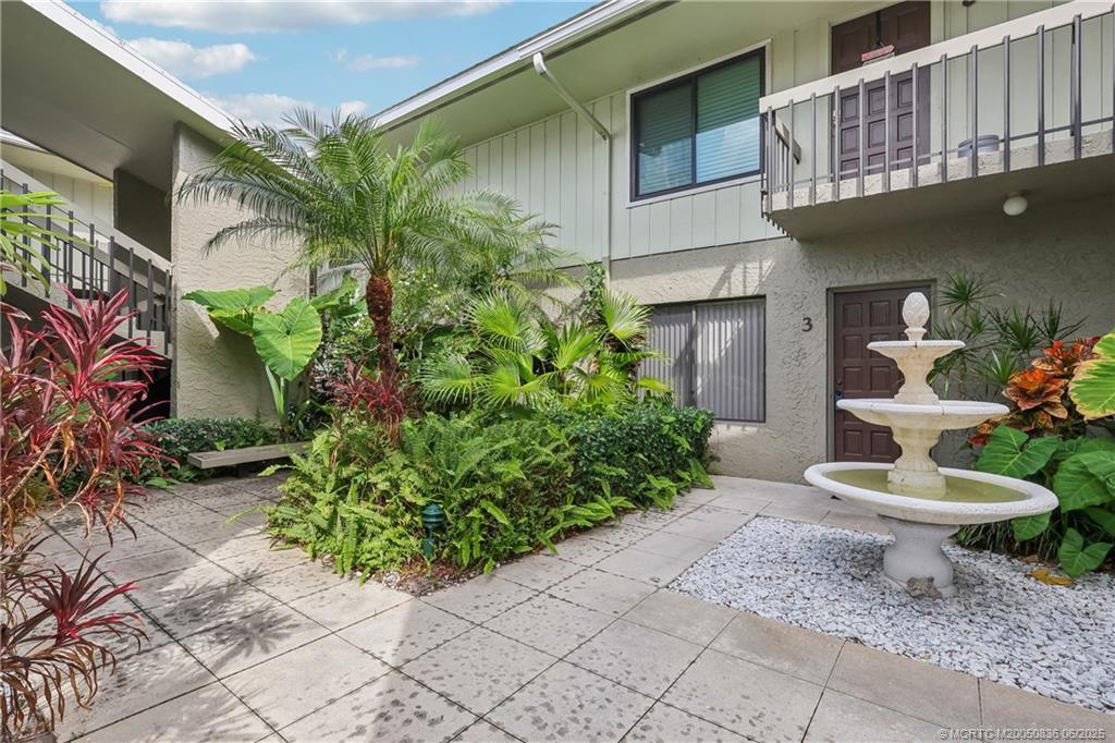 800 Northwest Fork Road, Unit 513 Stuart, FL 34994 - Photo 2 of 30 a view of a back yard of the house