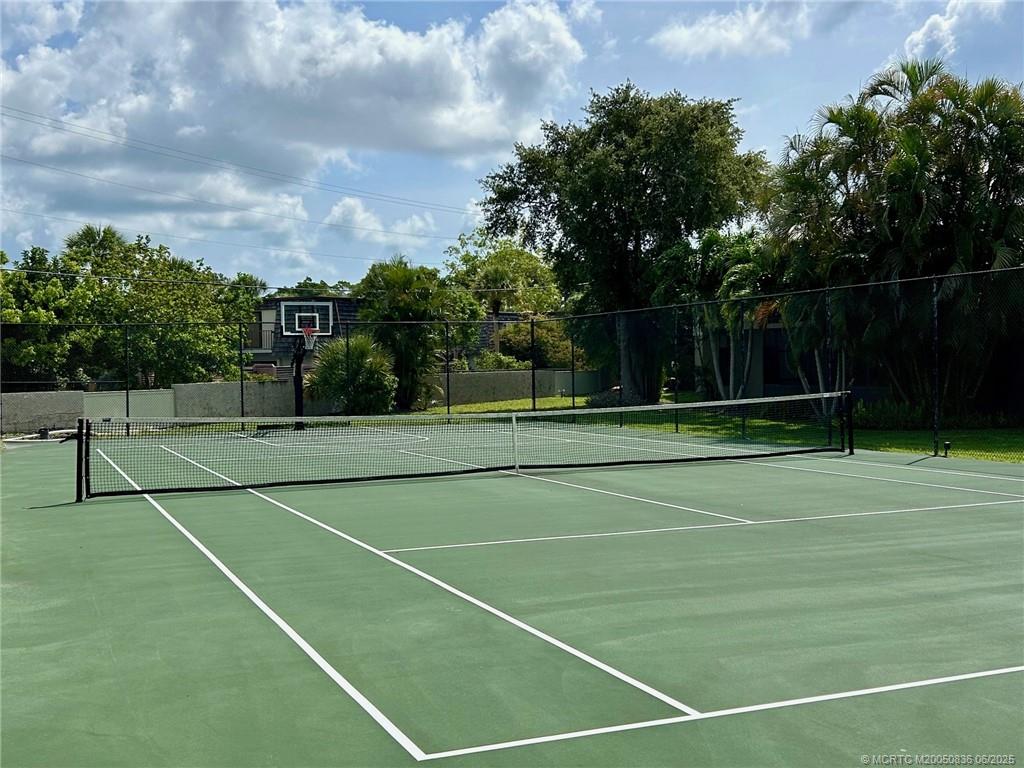 800 Northwest Fork Road, Unit 513 Stuart, FL 34994 - Photo 26 of 30 a view of a tennis court