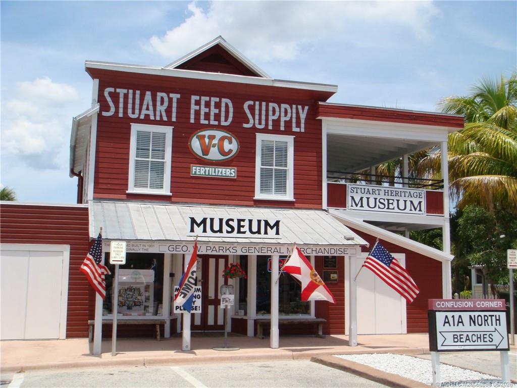 800 Northwest Fork Road, Unit 513 Stuart, FL 34994 - Photo 29 of 30 a view of a cafe with a couple of people seating on table and chairs