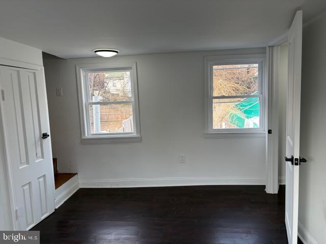 4278 Orchard Street Philadelphia, PA 19124 - Photo 13 of 19 a view of an empty room with wooden floor and a window