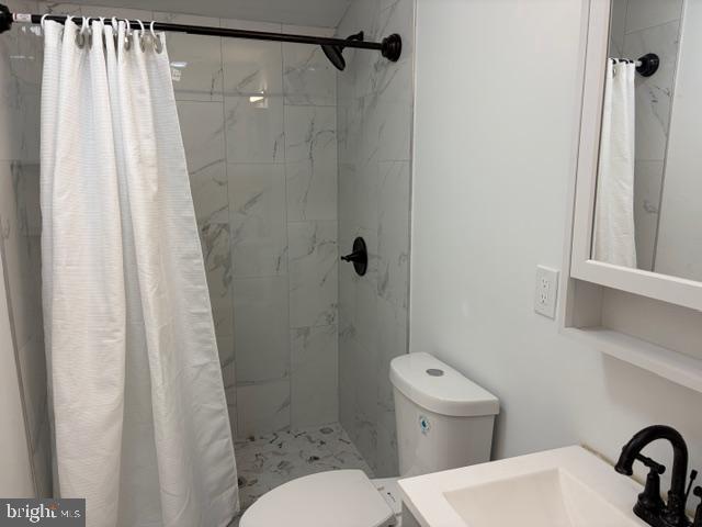 4278 Orchard Street Philadelphia, PA 19124 - Photo 4 of 19 a bathroom with a sink toilet and shower