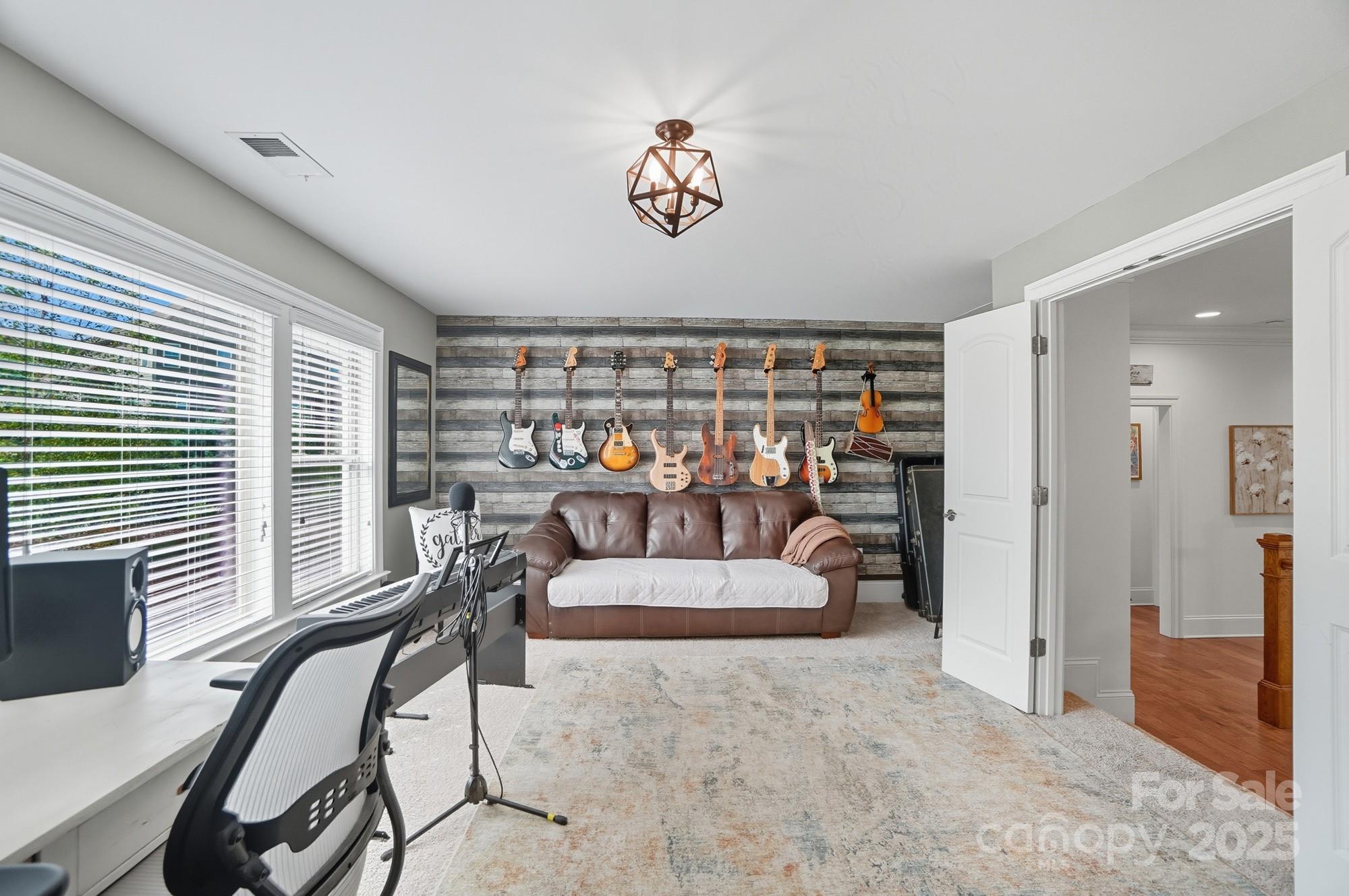 546 Abelia Lane Fort Mill, SC 29708 - Photo 22 of 43 a view of livingroom with furniture and window