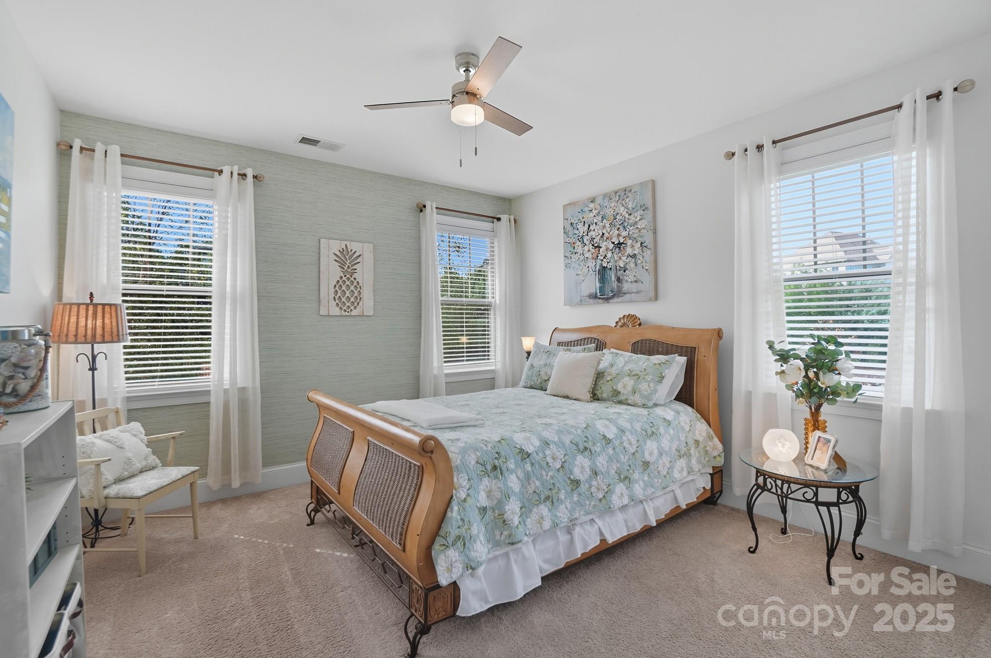 546 Abelia Lane Fort Mill, SC 29708 - Photo 26 of 43 a bedroom with a bed and a window