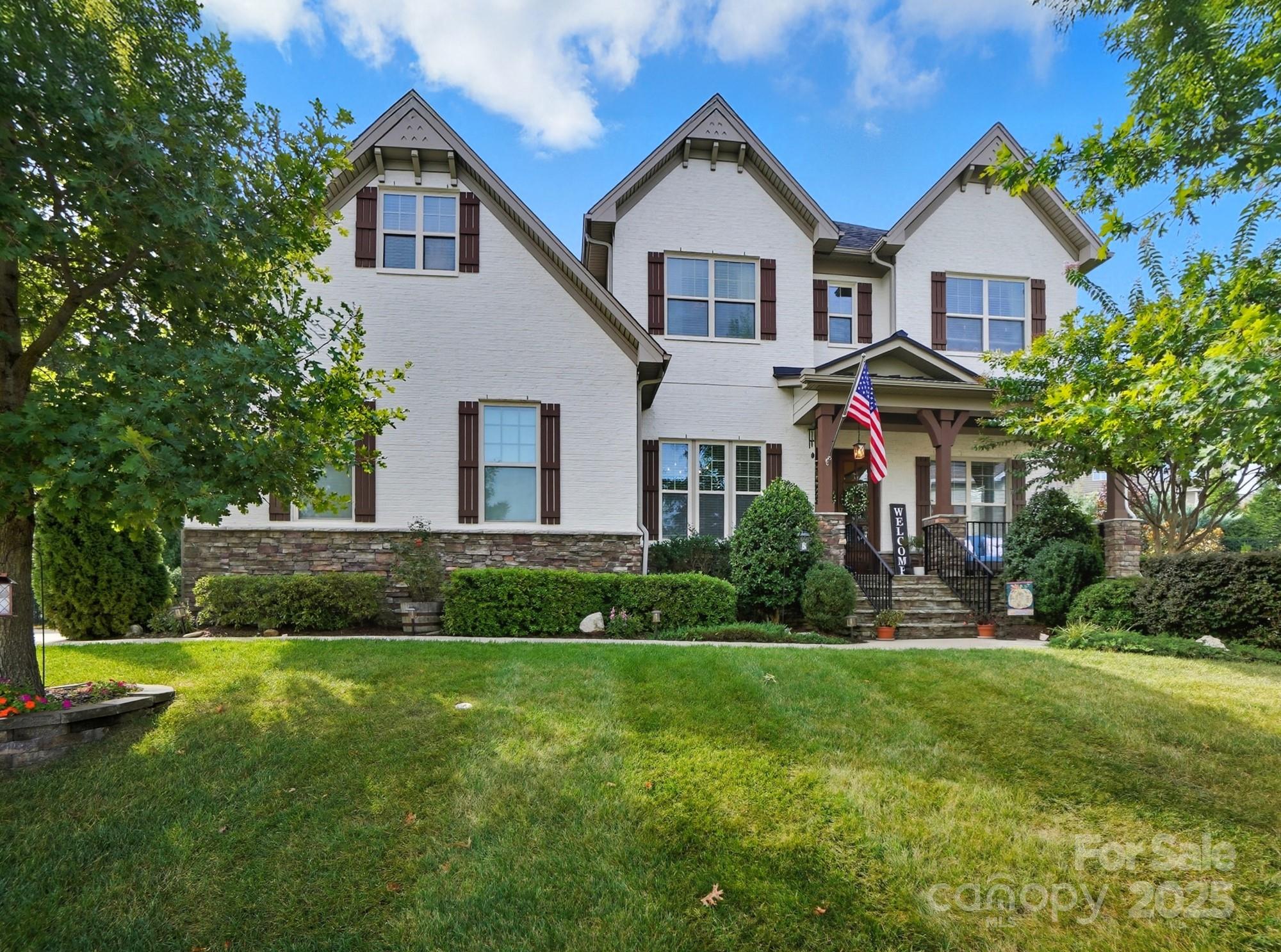 546 Abelia Lane Fort Mill, SC 29708 - Photo 3 of 43 a front view of a house with a yard