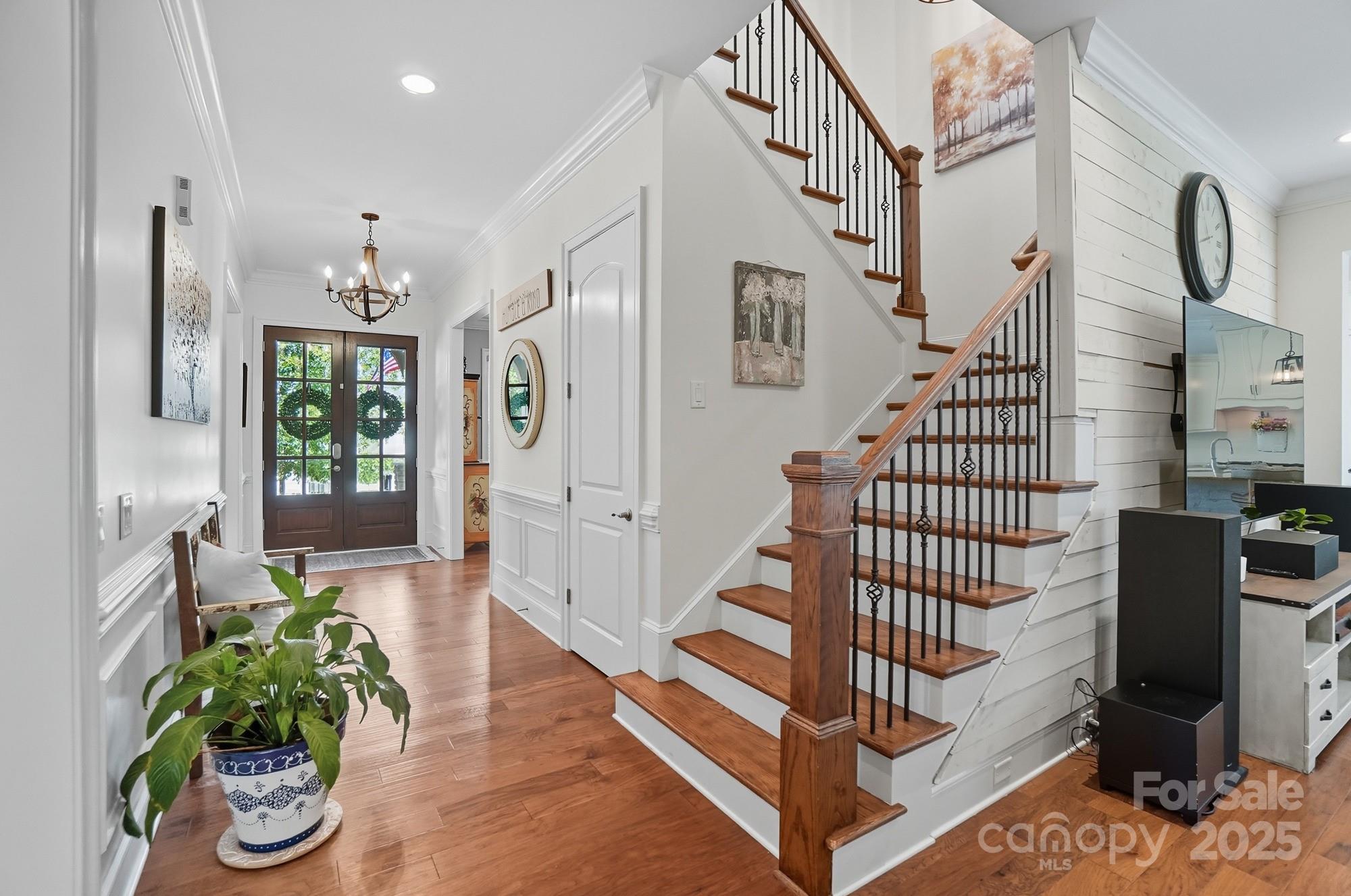 546 Abelia Lane Fort Mill, SC 29708 - Photo 7 of 43 a view of entryway with wooden floor