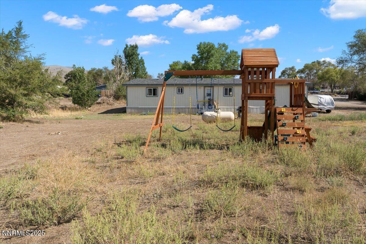 17570 Thrush Lane Reno, NV 89508 - Photo 27 of 30 a view of a house with backyard