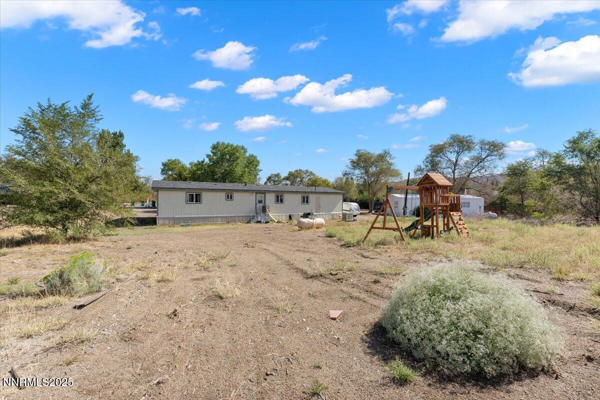 17570 Thrush Lane Reno, NV 89508 - Photo 28 of 30 a view of a dry yard with large trees