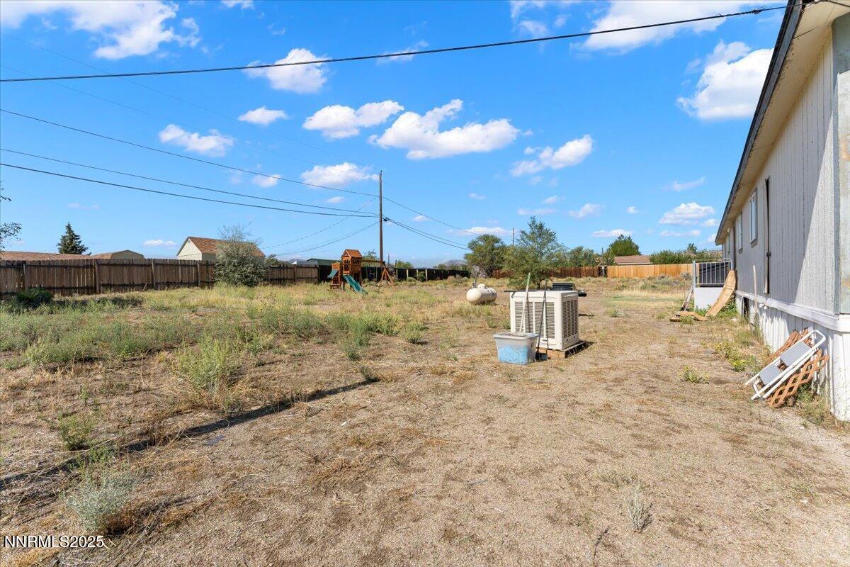 17570 Thrush Lane Reno, NV 89508 - Photo 30 of 30 a view of a lake with table and chair
