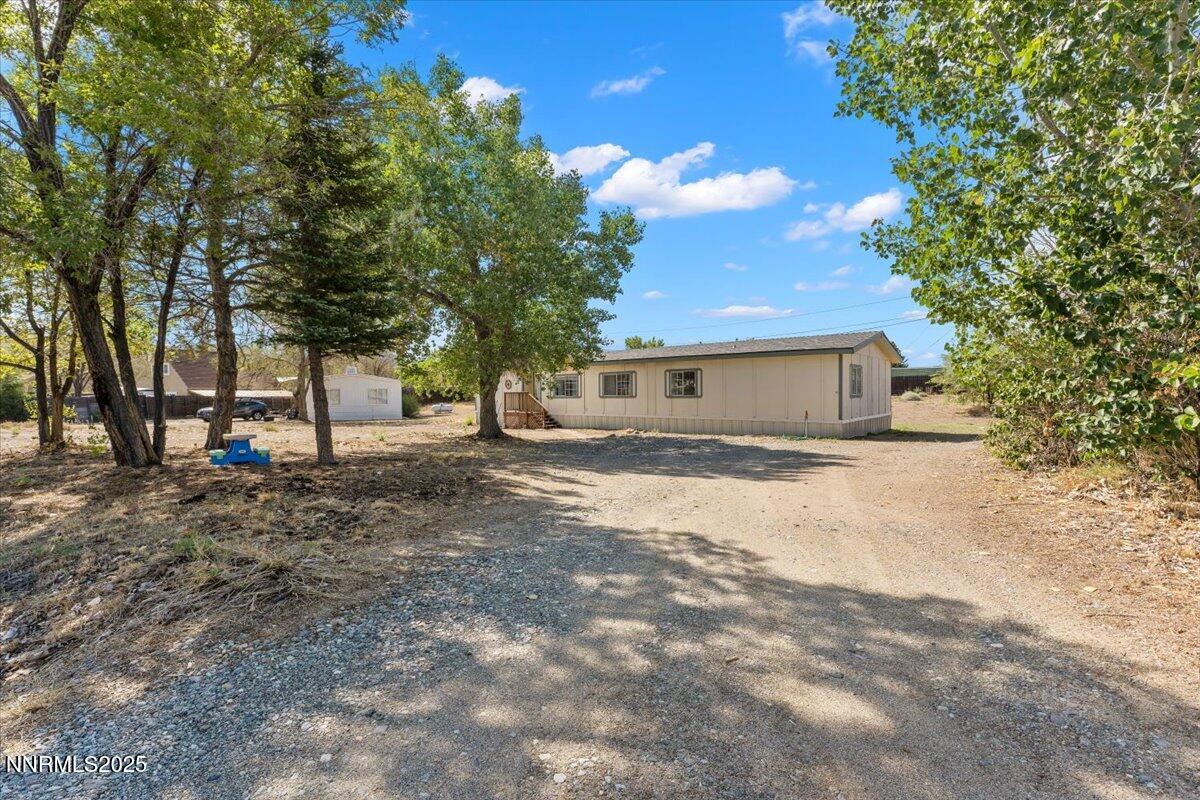 17570 Thrush Lane Reno, NV 89508 - Photo 3 of 30 a view of a house with a backyard
