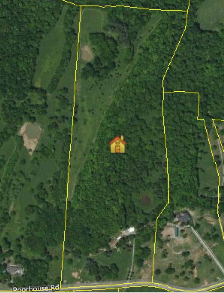171 Poorhouse Road Taft, TN 38488 - Photo 20 of 27 a backyard of a house