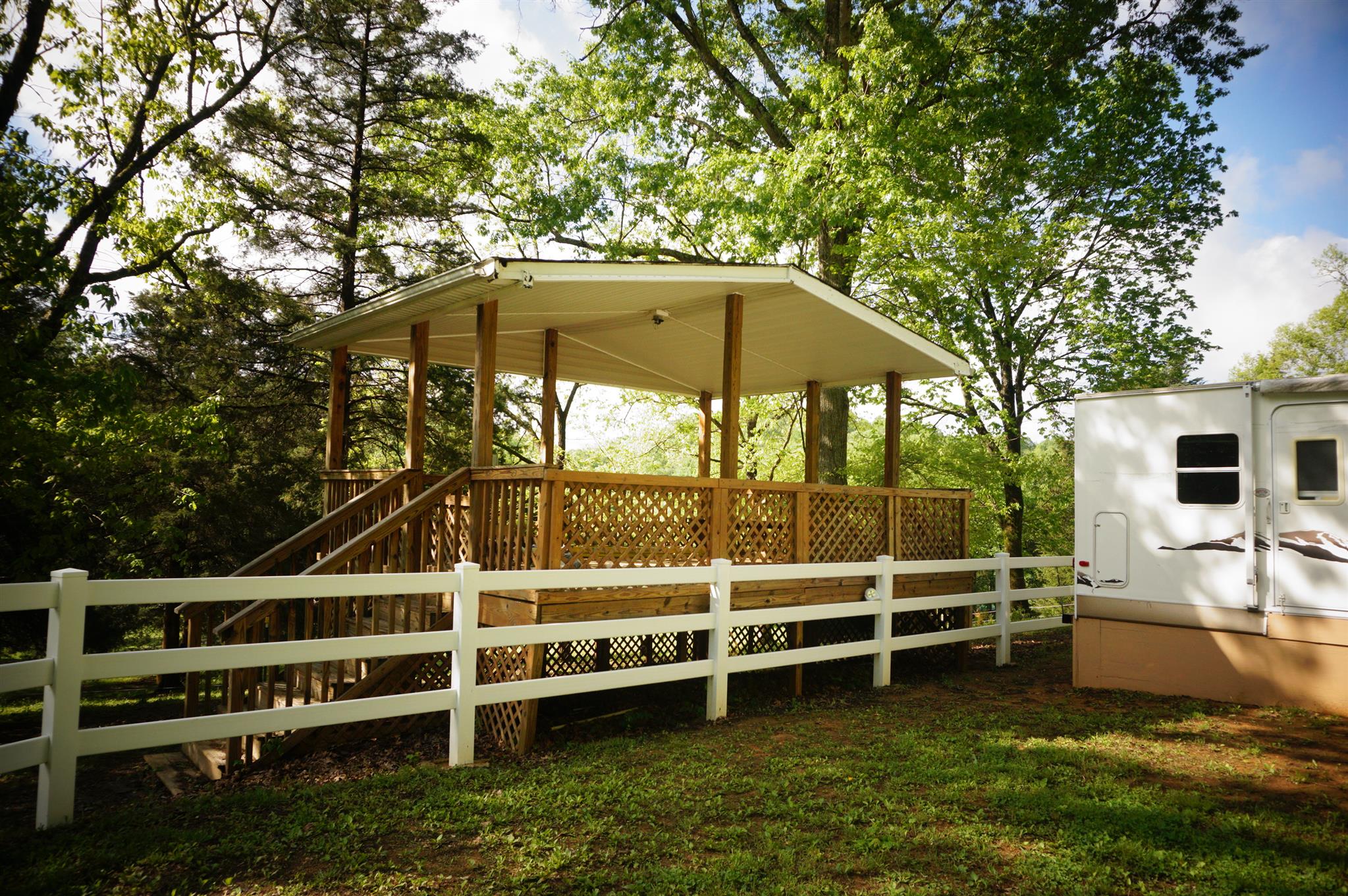 171 Poorhouse Road Taft, TN 38488 - Photo 10 of 27 a view of a house with a yard and sitting area