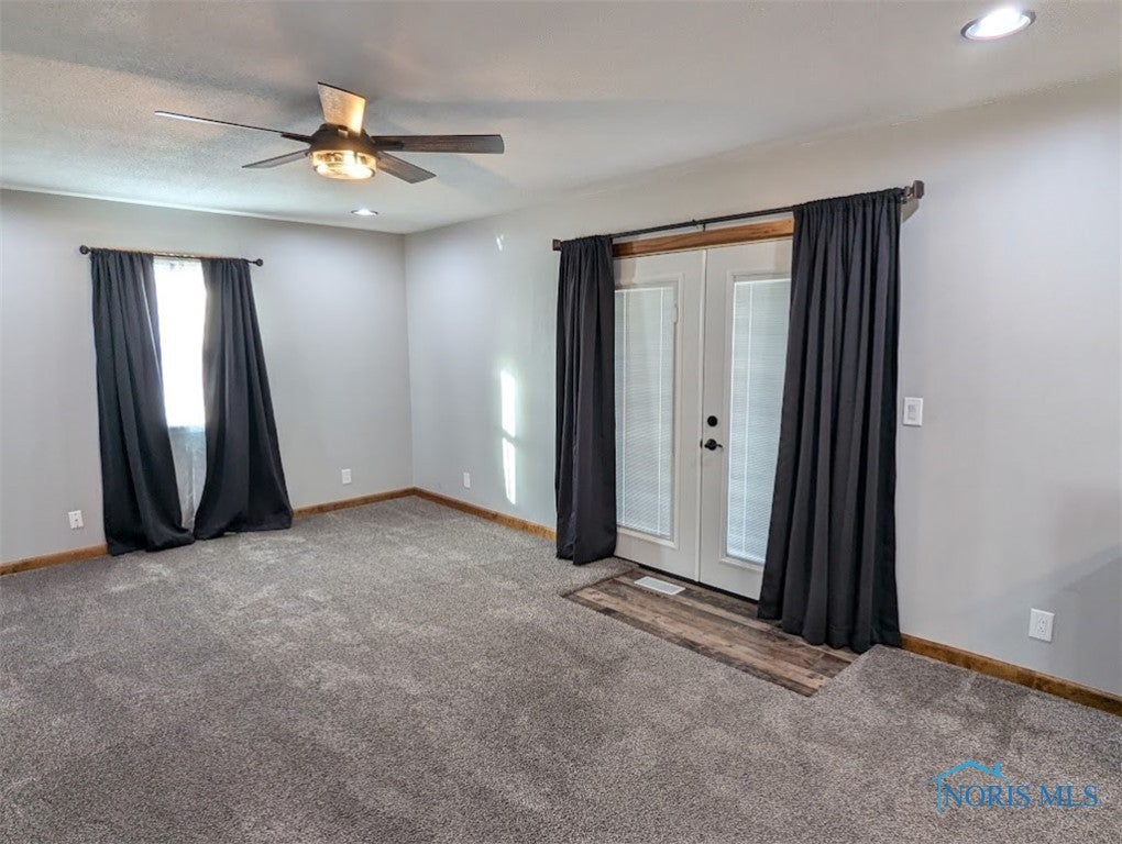 308 Indian Road Wauseon, OH 43567 - Photo 25 of 48 Door to Deck and backgroung. Perfect for summer entertaining.