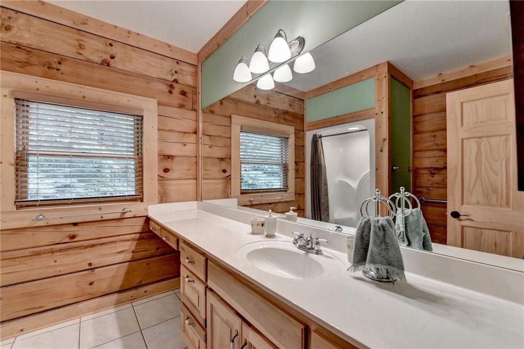 82 Walnut Grove Lane Tiger, GA 30576 - Photo 36 of 88 a bathroom with a sink and a mirror