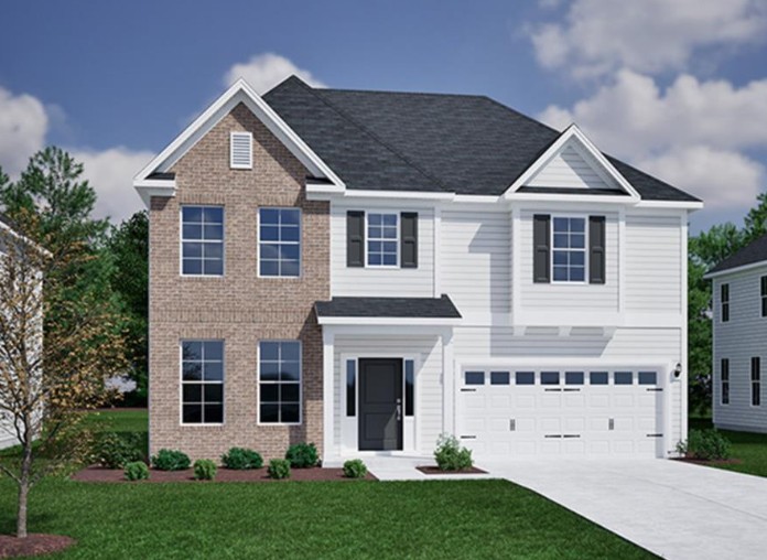 Classic brick and siding accents define the exterior of this two-story home.