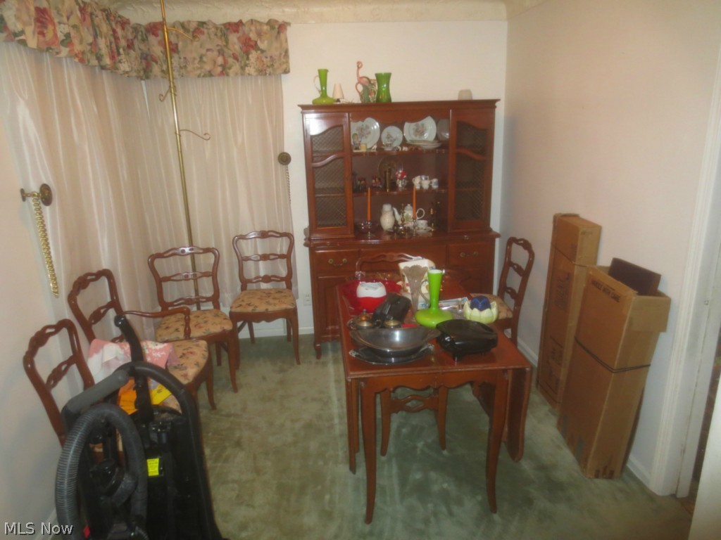 14355 Aquilla Road Burton, OH 44021 - Photo 10 of 22 10' x 9' dining room open to living room.