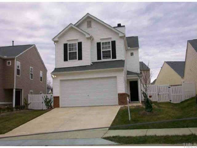 5530 Golden Moss Trail Raleigh, NC 27613 - Photo 1 of 1 a front view of a house with garden