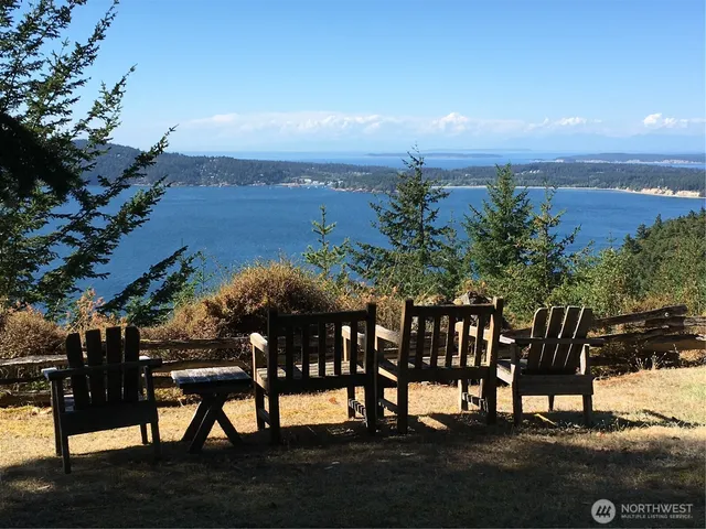 a view of a chairs and table on the terrace