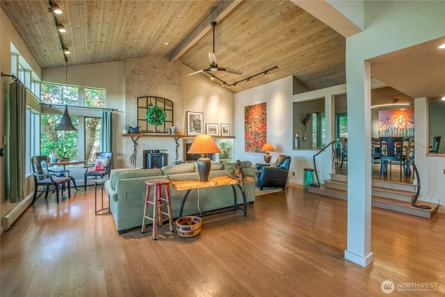 a bedroom with a bed and a lounge chair