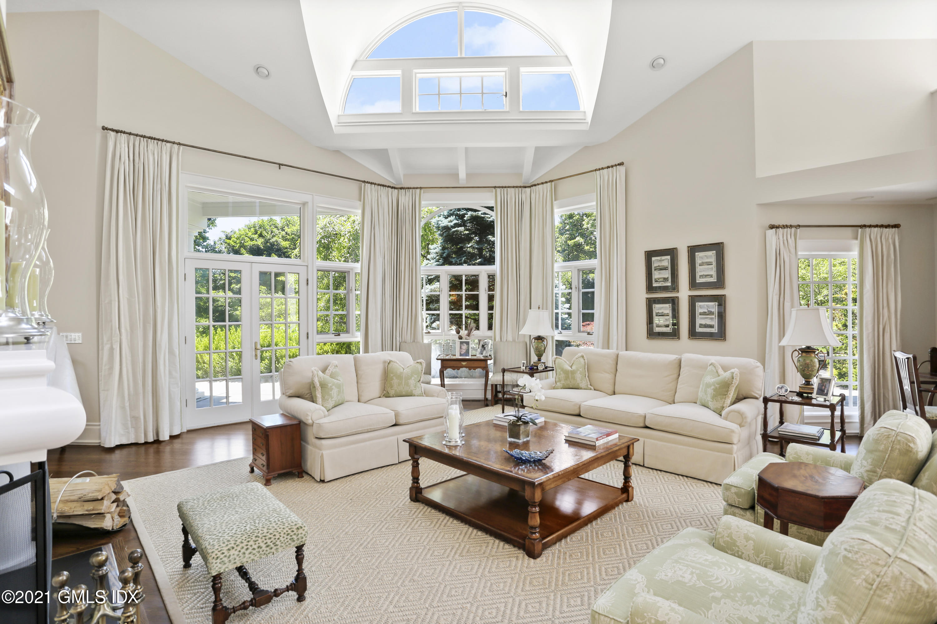 557 Round Hill Road Greenwich, CT 06831 - Photo 3 of 26 a living room with furniture and a large window