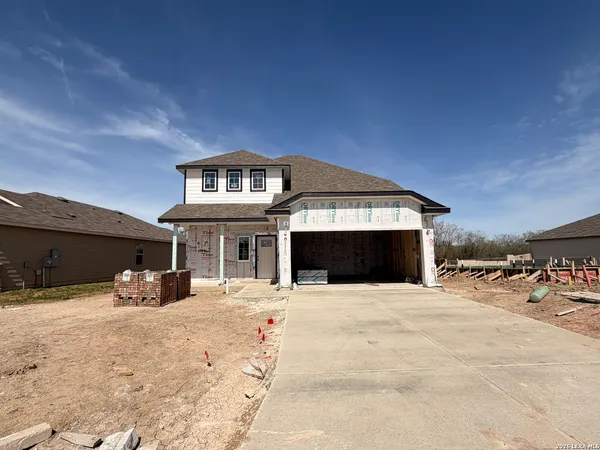 a front view of a house with large space
