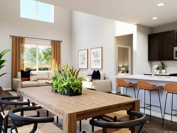 a kitchen with granite countertop a sink and stainless steel appliances
