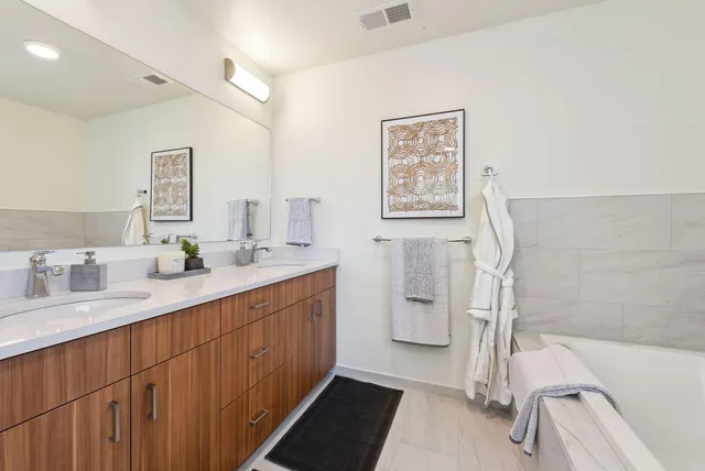 a bathroom with a shower and a sink