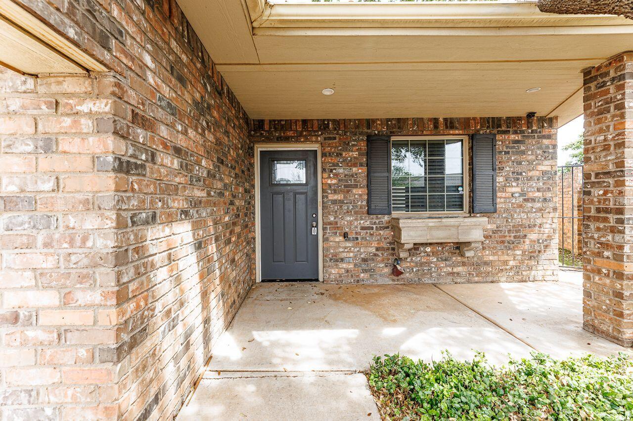 5811 11th Place, Unit 9 Lubbock, TX 79416 - Photo 3 of 50 a view of entrance
