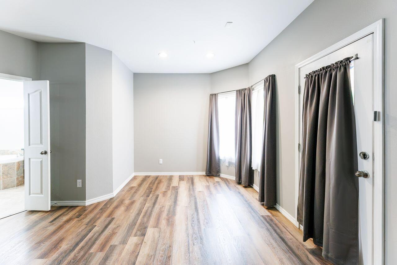 5811 11th Place, Unit 9 Lubbock, TX 79416 - Photo 36 of 50 a view of a room with a large window