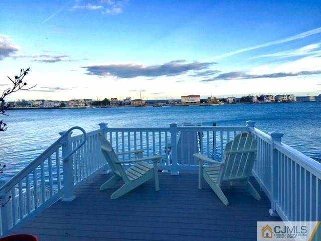 200 Portland Road, Unit 18B Highlands, NJ 07734 - Photo 1 of 18 a view of deck with patio