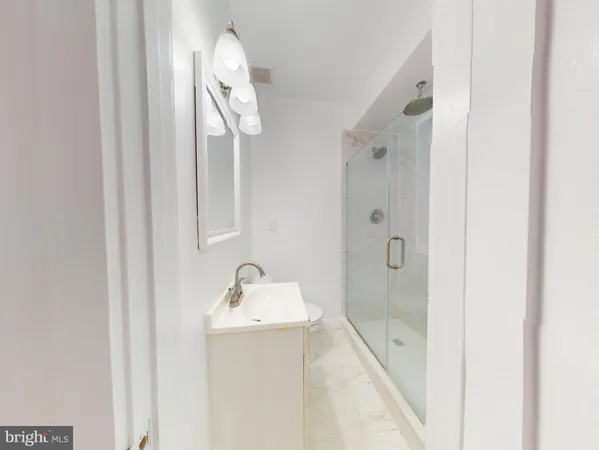 a bathroom with a bathtub and a sink