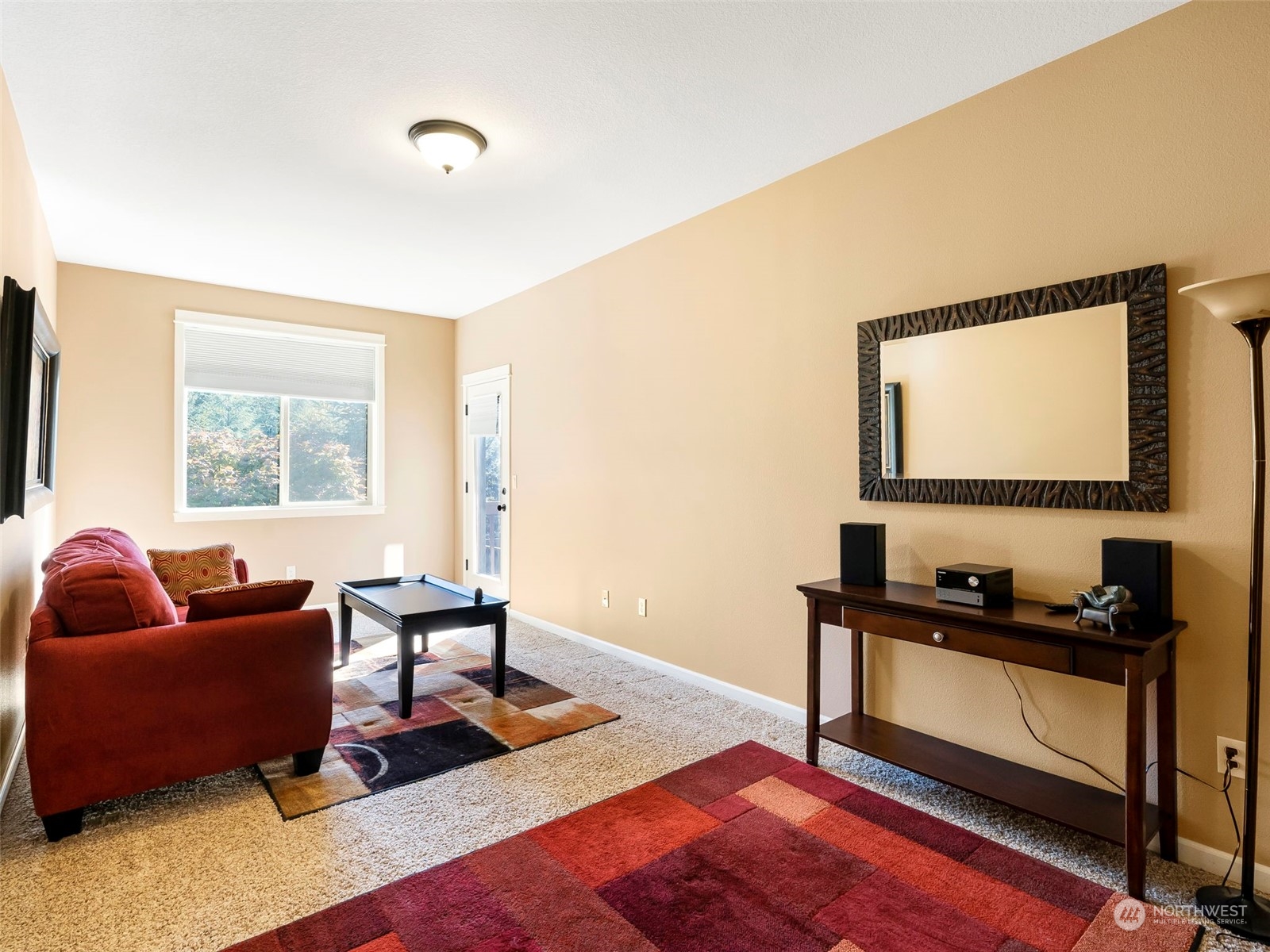 17005 Northeast 33rd Avenue Ridgefield, WA 98642 - Photo 13 of 38 a living room with furniture rug and a window