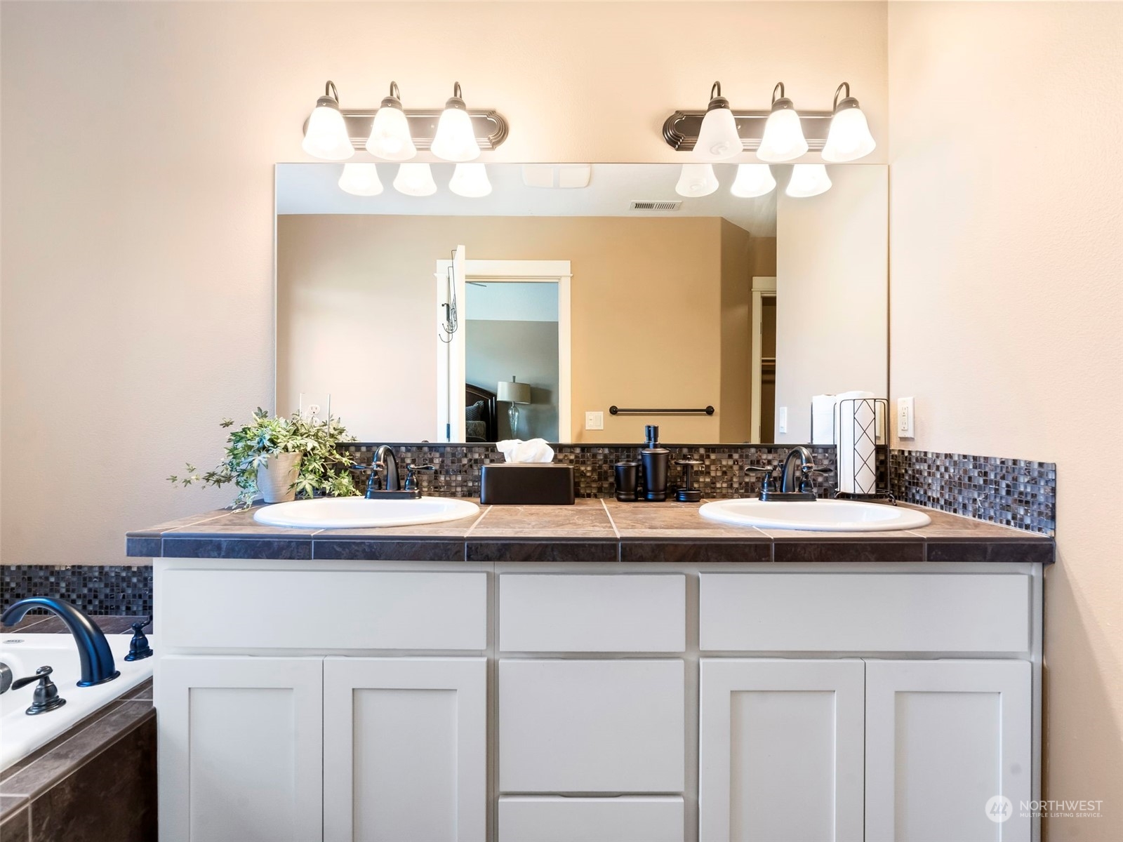 17005 Northeast 33rd Avenue Ridgefield, WA 98642 - Photo 17 of 38 a bathroom with a sink and a mirror