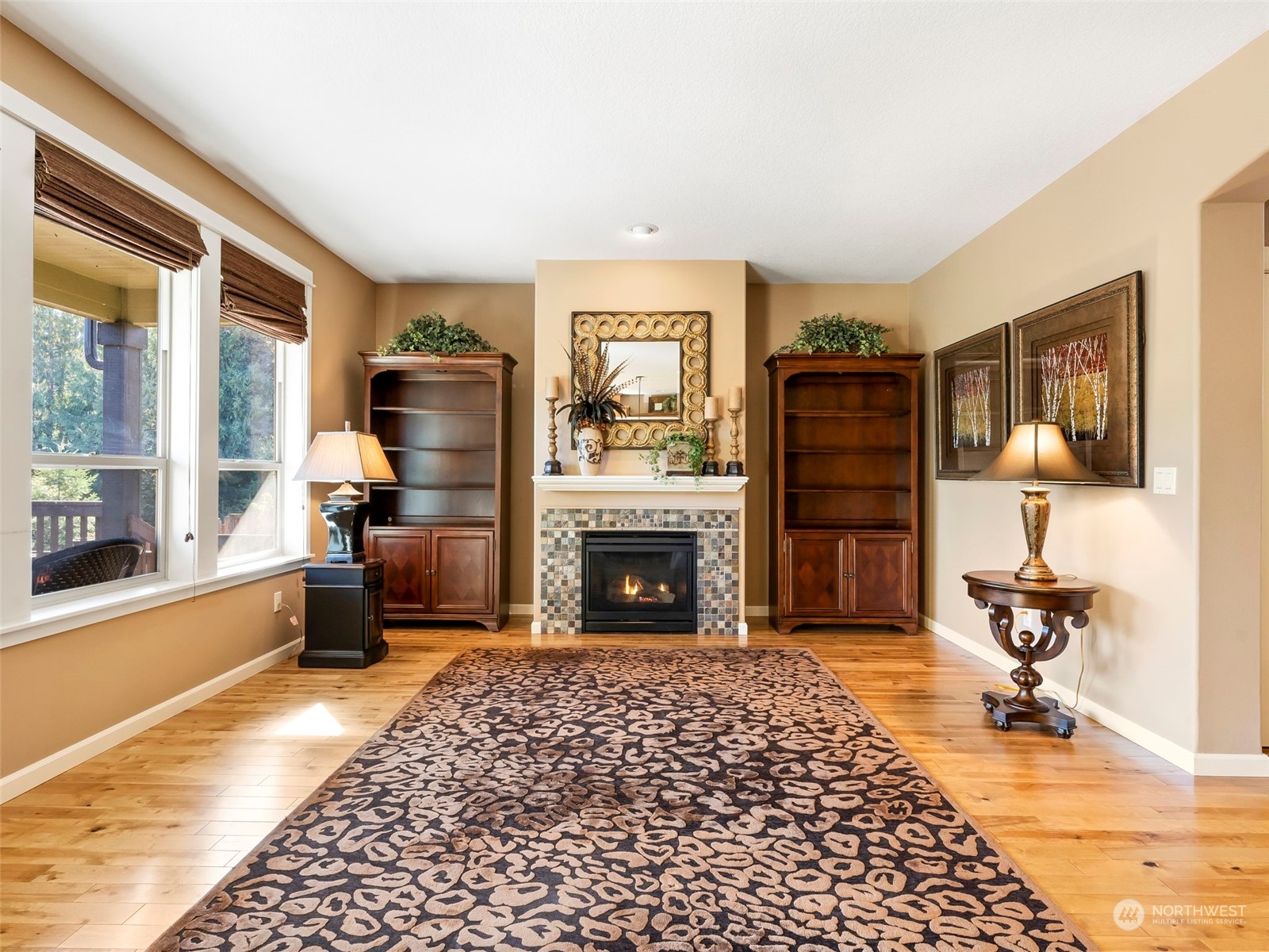 17005 Northeast 33rd Avenue Ridgefield, WA 98642 - Photo 3 of 38 a living room with furniture and a fireplace