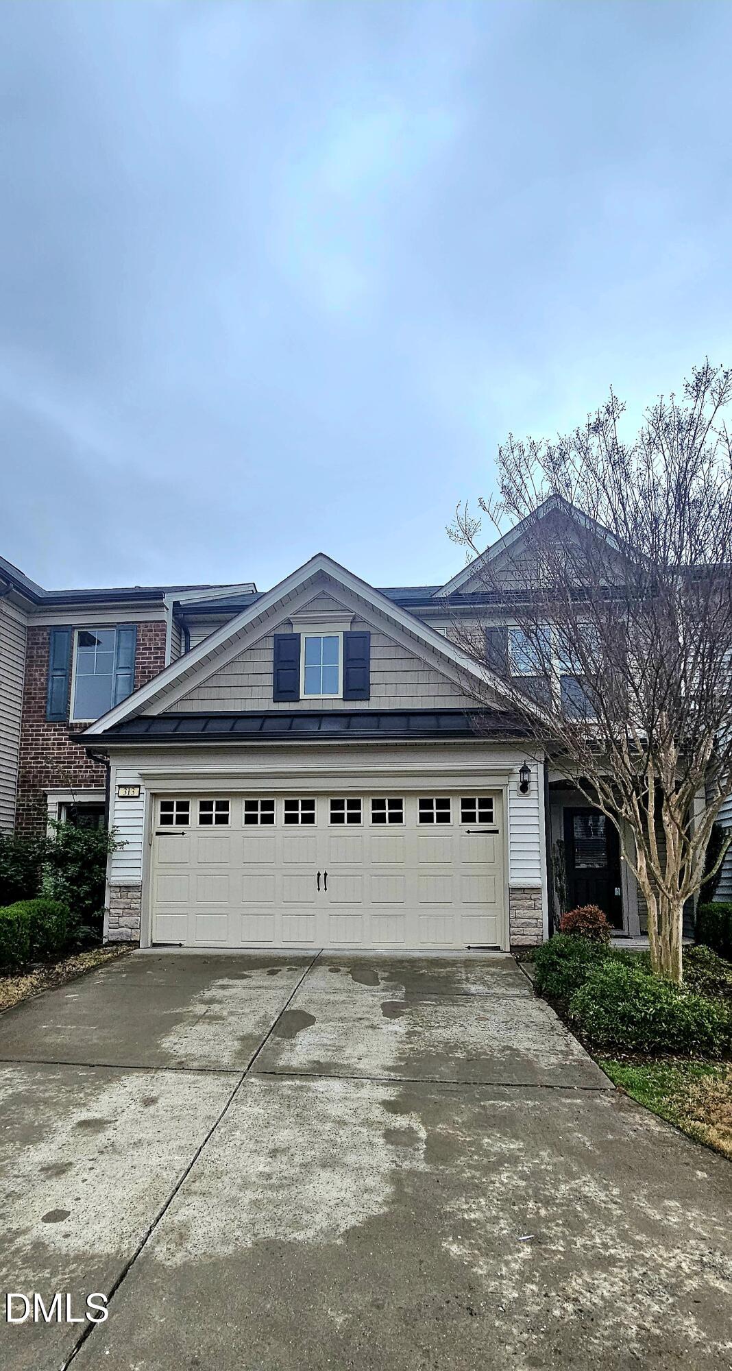 313 Brier Crossings Loop Durham, NC 27703 - Photo 1 of 27 front view of a house with a big yard