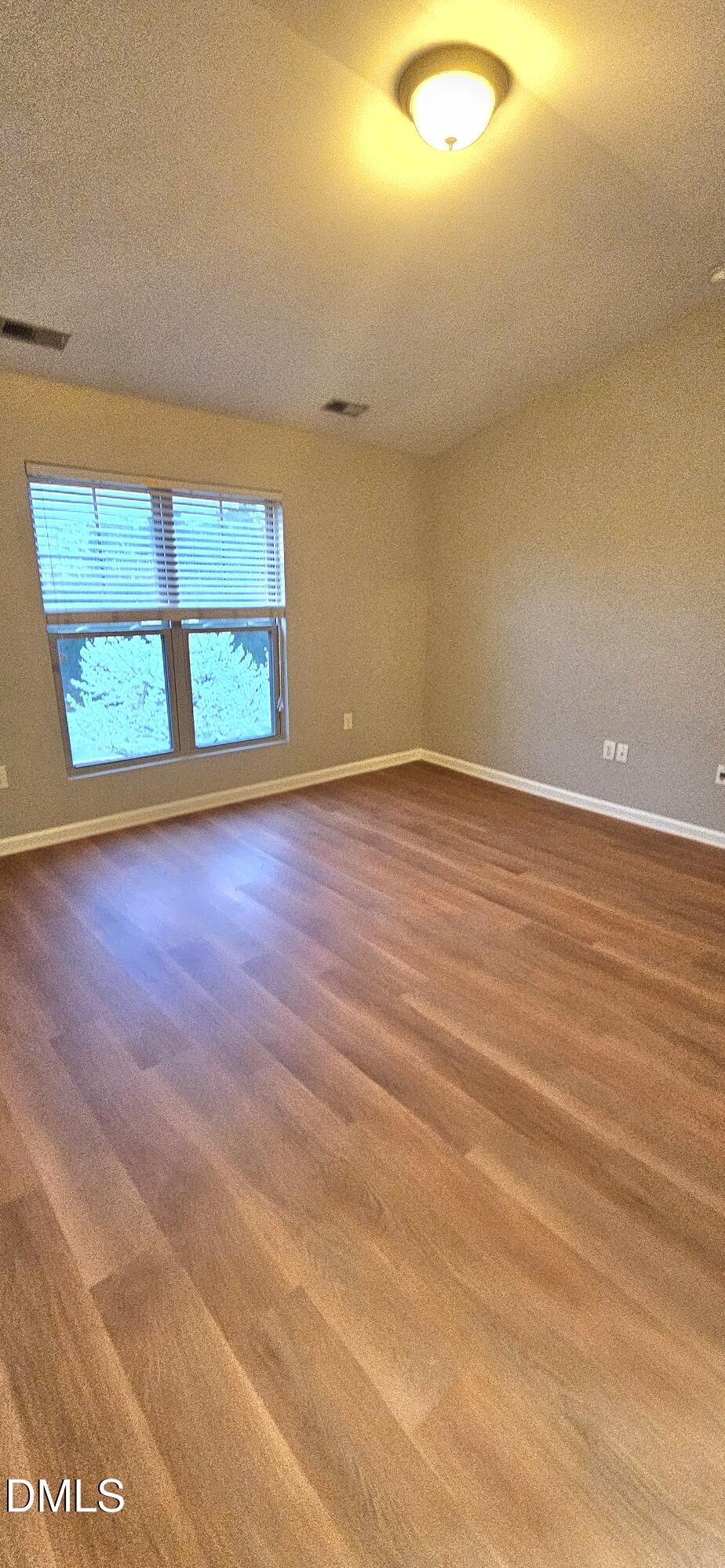 313 Brier Crossings Loop Durham, NC 27703 - Photo 17 of 27 an empty room with a window