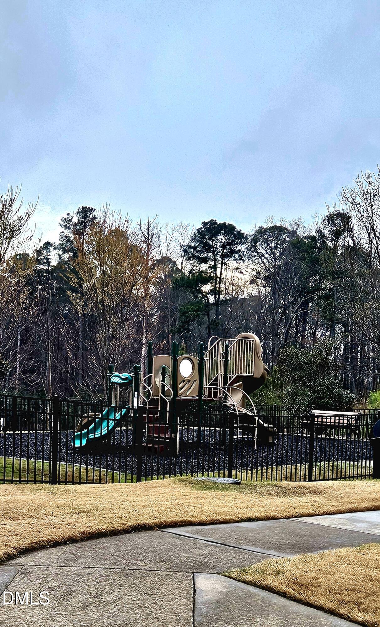 313 Brier Crossings Loop Durham, NC 27703 - Photo 26 of 27 a view of swimming pool with outdoor seating and deck
