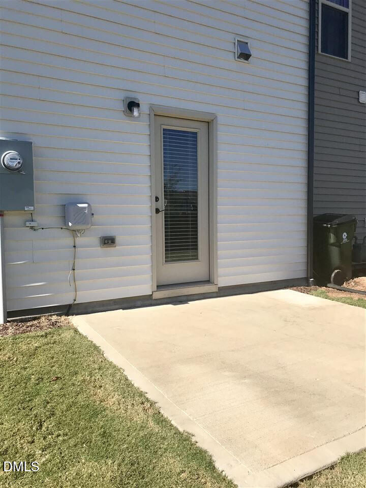 313 Brier Crossings Loop Durham, NC 27703 - Photo 3 of 27 a house with a outdoor space