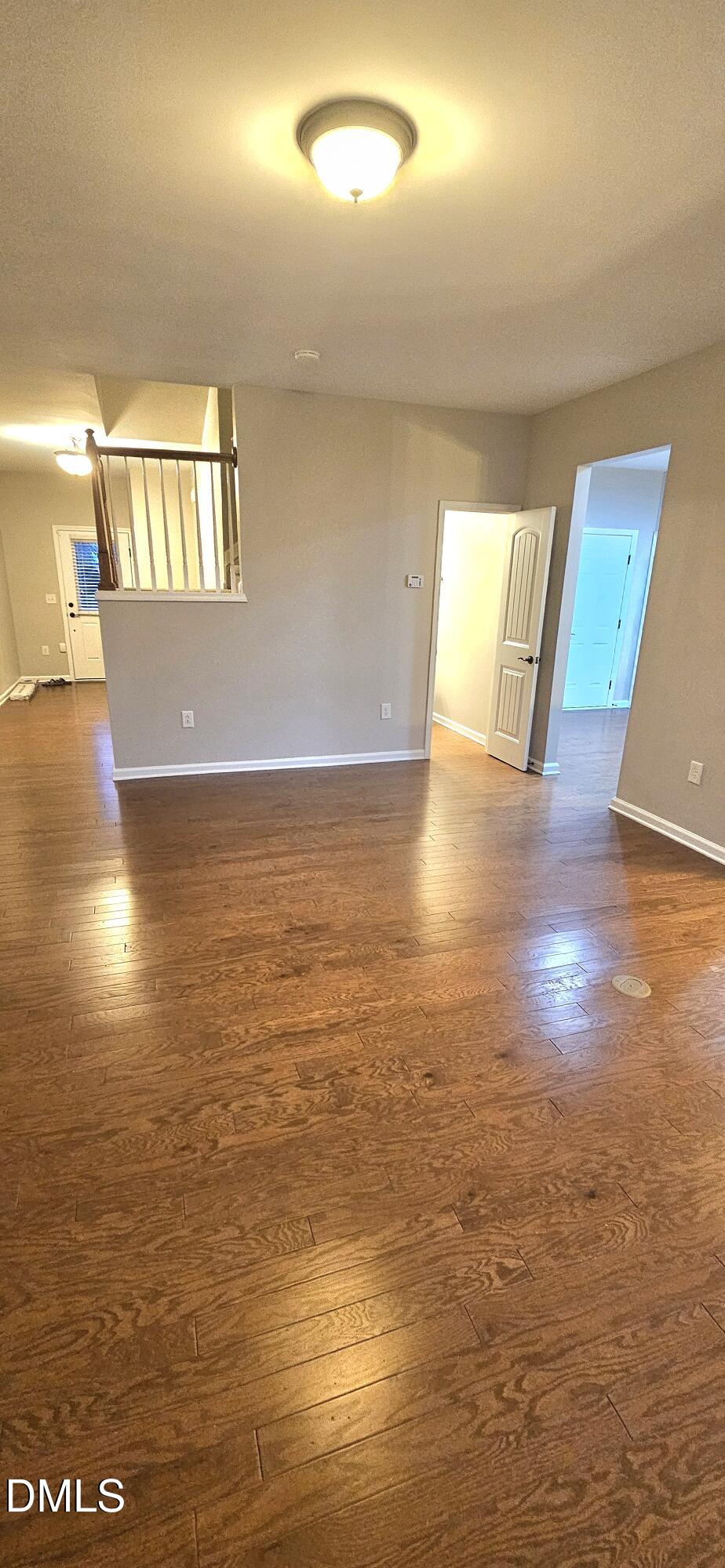 313 Brier Crossings Loop Durham, NC 27703 - Photo 6 of 27 a view of a room with wooden floor