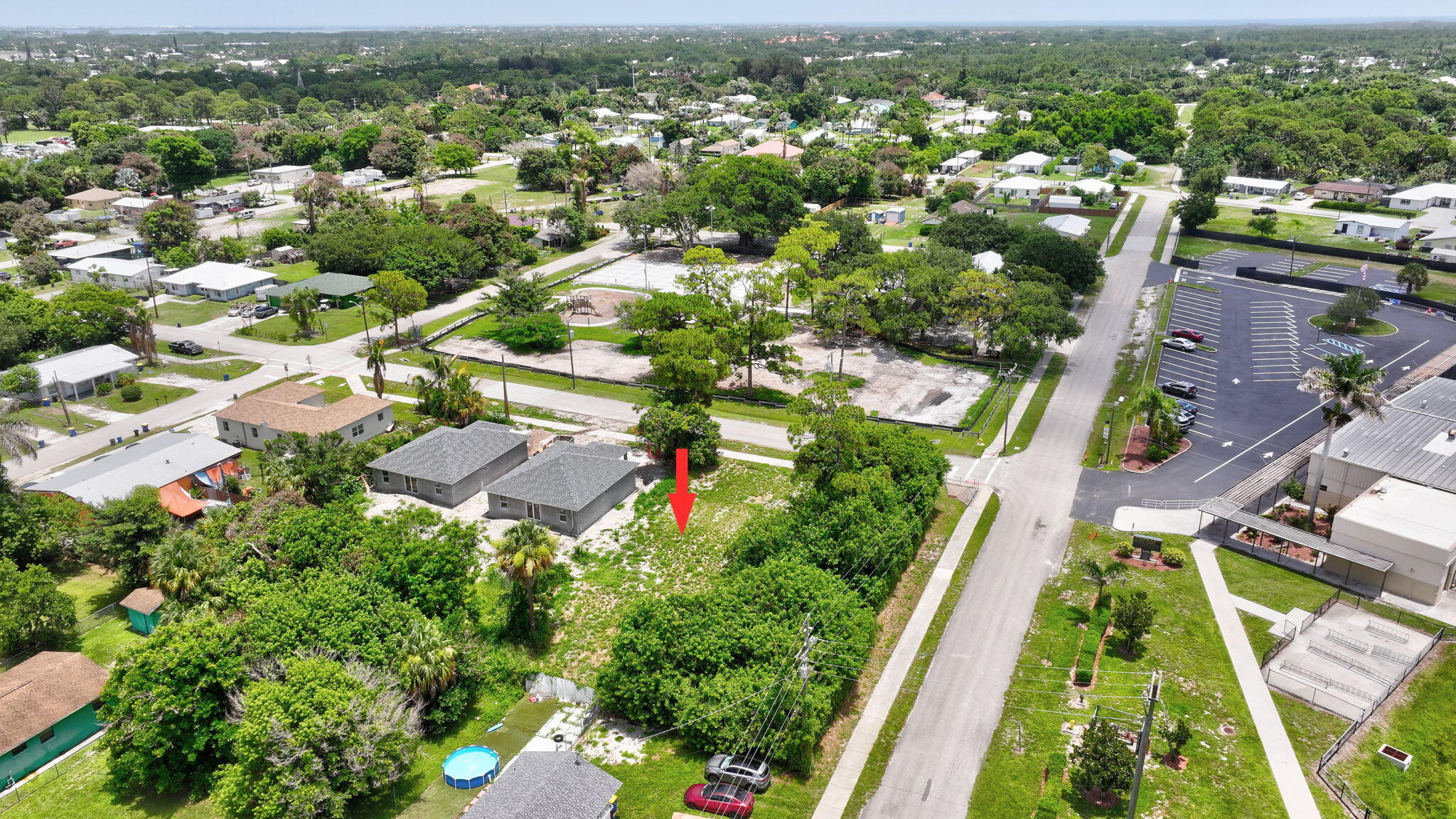 5684 Southeast 45th Avenue Stuart, FL 34997 - Photo 2 of 27 2-web-or-mls-DJI_20260620050001_0041_D_2