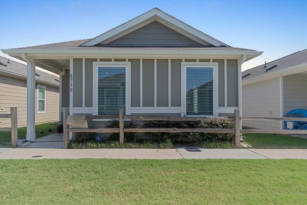 8730 Texas Risinger Drive Fort Worth, TX 76123 - Photo 1 of 19 a front view of a house with a yard