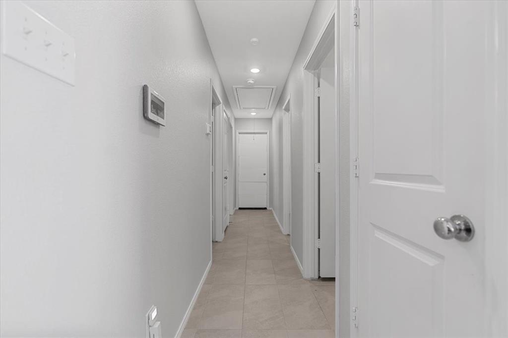 8730 Texas Risinger Drive Fort Worth, TX 76123 - Photo 2 of 19 a view of a hallway