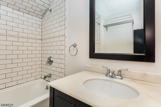 a bathroom with a sink and a bathtub