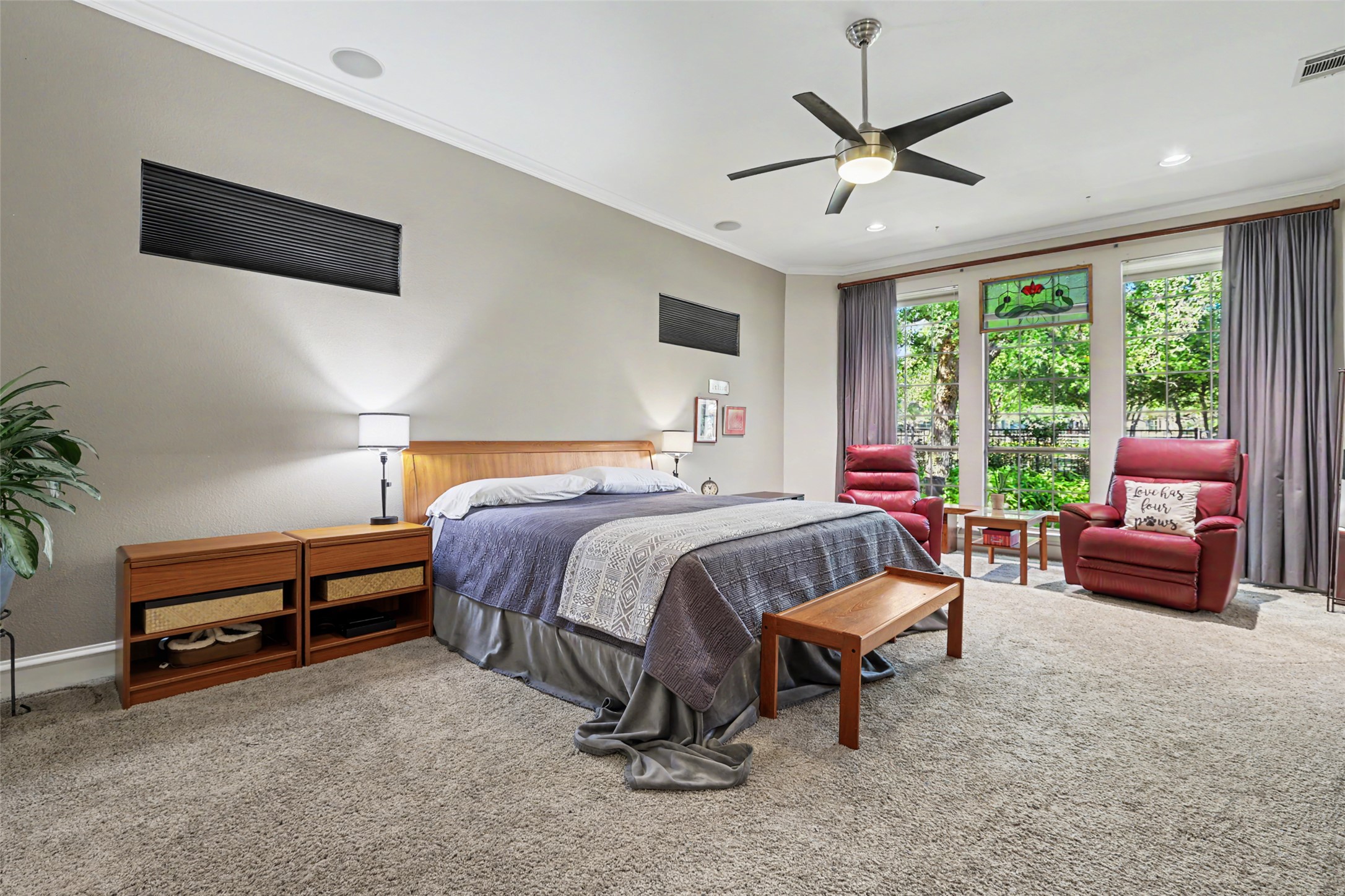805 Boquilla Trail Georgetown, TX 78633 - Photo 19 of 40 a spacious bedroom with a bed and a chandelier