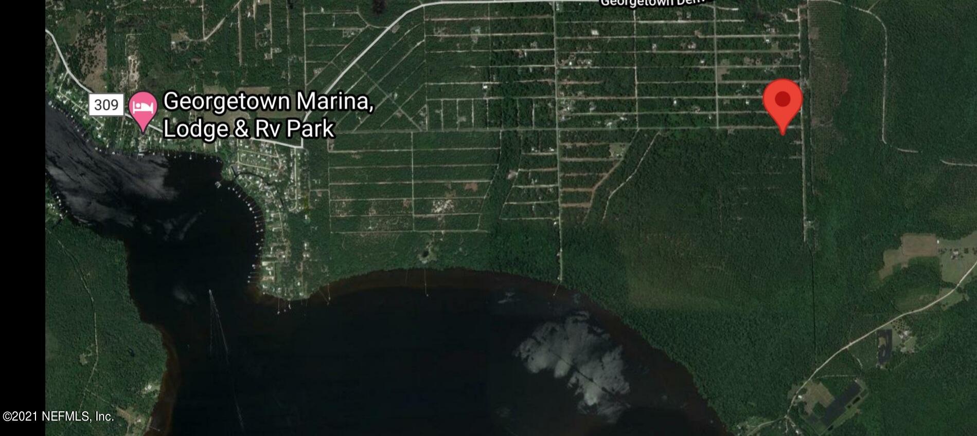 332 Edgewood Drive Georgetown, FL 32139 - Photo 5 of 6 a bathroom with a shower and a sink